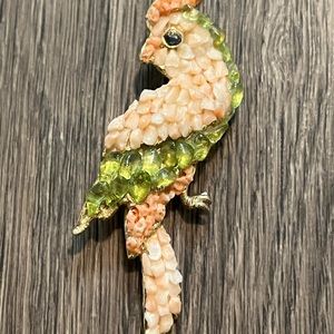 Gold Gilt Parakeet Antique Brooch. Semi-precious gemstones covering the bird.